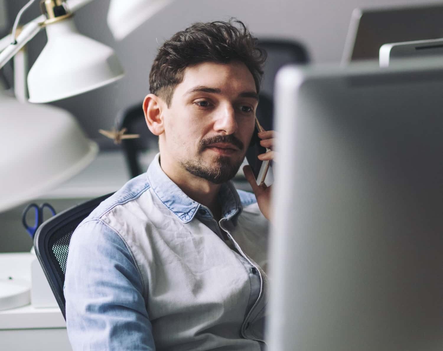 Blog 4 handsome businessman working in office using mobil 2021 08 26 15 54 47 utc min e1764202385638